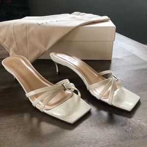 BY FAR Libra Slides in white